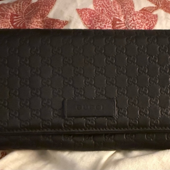 Gucci Handbags - Gucci Dark Brown Embossed Leather Wallet